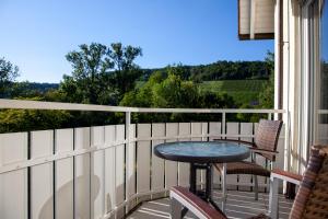 Ein Balkon oder eine Terrasse in der Unterkunft Pension-Bistro-M
