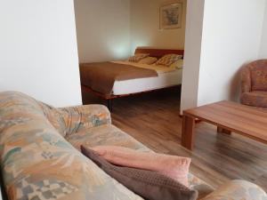 Postel nebo postele na pokoji v ubytování Pension Robin Hood