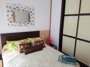 מיטה או מיטות בחדר ב-HABITACIONES CON WC PROPIO, COCINA COMPARTIDA Sopela LBI217