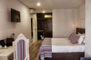 Letto o letti in una camera di Art'Otel Barcelos