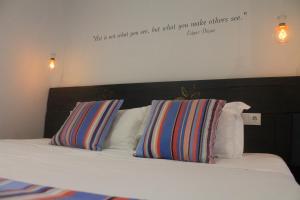 Letto o letti in una camera di Art'Otel Barcelos