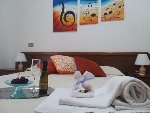 Postel nebo postele na pokoji v ubytování IERRE B&B il piacere dell accoglienza