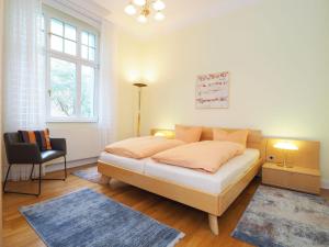 Postel nebo postele na pokoji v ubytování Villa Annelies Wohnung 1