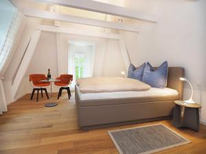 Ліжко або ліжка в номері Ferienhaus Kleines Palais