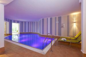 Bazén v ubytování Villa Usedom Wohnung 23 nebo v jeho okolí