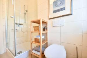 Ένα μπάνιο στο Villa Waldschloss Wohnung 02 +9 φωτογραφίες