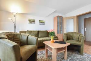 Ein Sitzbereich in der Unterkunft Ferienwohnung Elunia