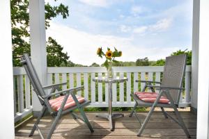 Ein Balkon oder eine Terrasse in der Unterkunft (27a) Villa Seestern 05