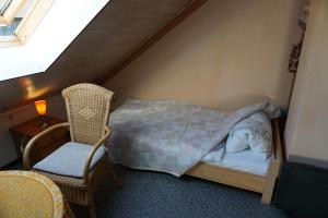 Postel nebo postele na pokoji v ubytování Zum Eisenkini