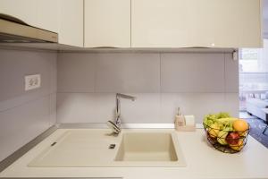 Kuchyň nebo kuchyňský kout v ubytování Apartment Lulu + 18 fotografií