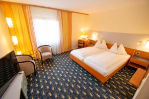 Letto o letti in una camera di Hotel Rokohof