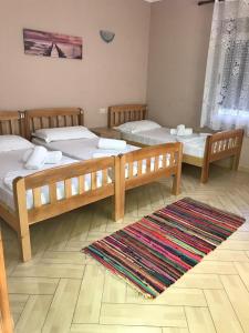 מיטה או מיטות בחדר ב-Hotel Durres Vila 53