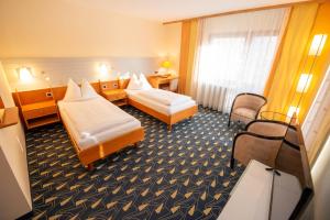 Letto o letti in una camera di Hotel Rokohof
