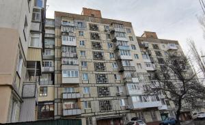 a tall apartment building with many windows at Spas`ka Apartment in Peresadovka