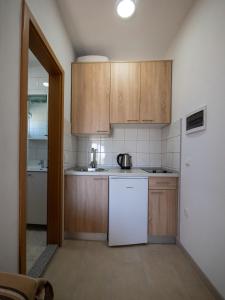 Kuchyňa alebo kuchynka v ubytovaní Apartments Tri Mora