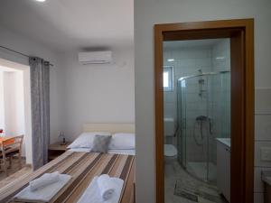 Kúpeľňa v ubytovaní Apartments Tri Mora