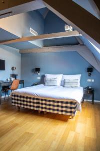 Rúm í herbergi á Hotel ML
