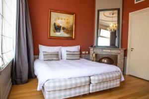 Rúm í herbergi á Hotel ML