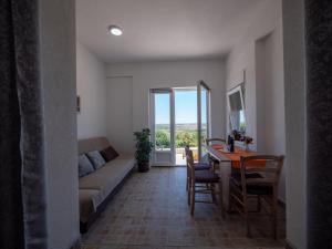 Posedenie v ubytovaní Apartments Tri Mora