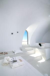 Posteľ alebo postele v izbe v ubytovaní Philosophia Luxury Villa