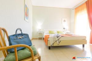 Postel nebo postele na pokoji v ubytování Paradise Beach Resort Selinunte