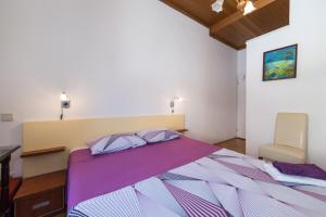 Postel nebo postele na pokoji v ubytování Apartment Riva