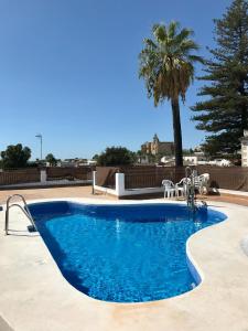 A piscina localizada em Apartamento San Juan, Parking privado ou nos arredores