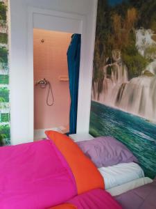 Ένα ή περισσότερα κρεβάτια σε δωμάτιο στο Appartements Proche du centre +18 φωτογραφίες