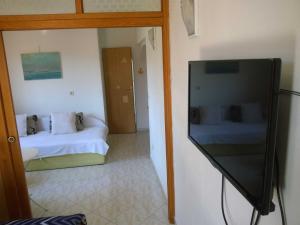 Televízia a/alebo spoločenská miestnosť v ubytovaní North Adriatic View Apartment