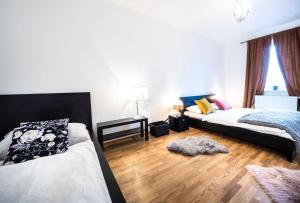 Postel nebo postele na pokoji v ubytování Silvie Apartments - Zlaté Terasy