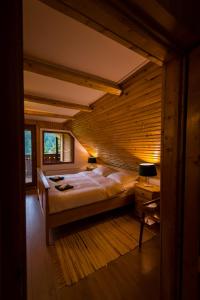 Ένα ή περισσότερα κρεβάτια σε δωμάτιο στο Chalet M