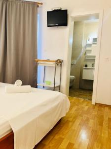 Posteľ alebo postele v izbe v ubytovaní Guest House Stipe