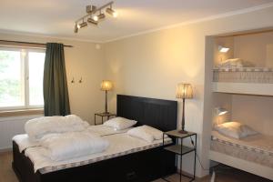 Cama o camas de una habitación en Berggatan Villa - lägenhet 2