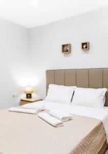 Postel nebo postele na pokoji v ubytování Fantasia Villas Deluxe "Selene"