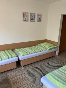 A bed or beds in a room at Villa Elena