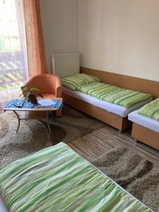A bed or beds in a room at Villa Elena
