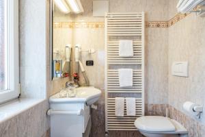 Koupelna v ubytování Hotel Meida