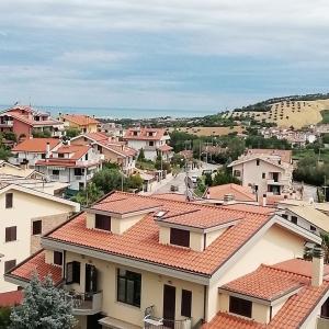 a view of a town with houses and roofs at A casa di cinzia in Pineto +42 photos