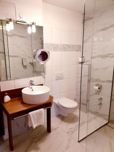 Ein Badezimmer in der Unterkunft Hotel Via Roma