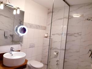 Ein Badezimmer in der Unterkunft Hotel Via Roma