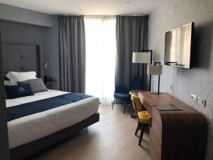 Posteľ alebo postele v izbe v ubytovaní Hotel Lima - Adults Recommended