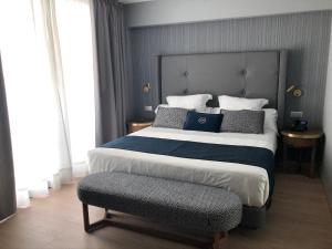 Posteľ alebo postele v izbe v ubytovaní Hotel Lima - Adults Recommended