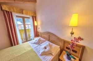 Fotografie z fotogalerie ubytování Hotel Alpino Al Cavalletto v destinaci Canazei