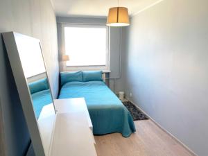 Postel nebo postele na pokoji v ubytování Avis Apartments - City Gdynia 38