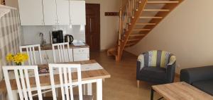 Kuchyň nebo kuchyňský kout v ubytování Apartamenty Fala