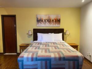 
Un ou plusieurs lits dans un hébergement de l'établissement Hotel Visitel
