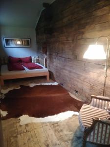 Postel nebo postele na pokoji v ubytování Mountain Hostel Gimmelwald