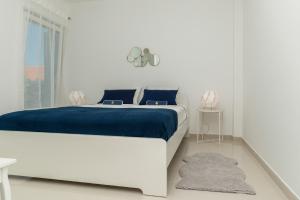 מיטה או מיטות בחדר ב-Čikat bay residence