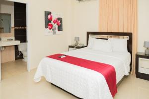 Postel nebo postele na pokoji v ubytování Hostal San Francisco de Asis