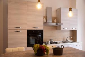 A kitchen or kitchenette at Guglielmo Tell Suite